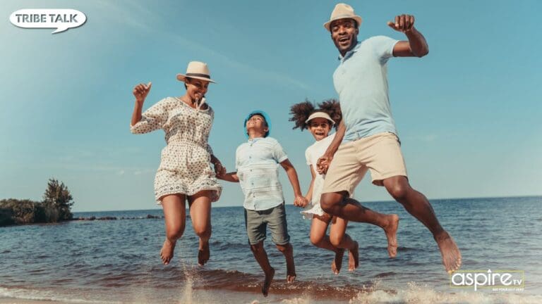 Black family at the beach.